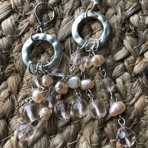 Statement earrings with light pink beads